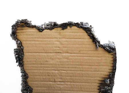 charred paper on a white backgroundの写真素材