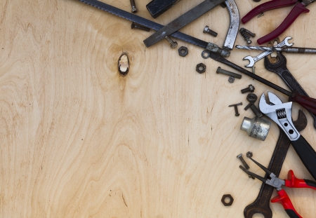Set of different tools on wooden backgroundの写真素材
