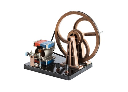 Training electric generator for physics lessons isolated on white backgroundの写真素材