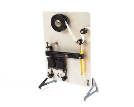 vintage morse telegraph machine isolated on white backgroundの写真素材