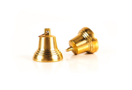 two golden bell isolated on white background