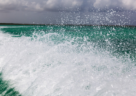 splashes and waves of the sea close upの写真素材