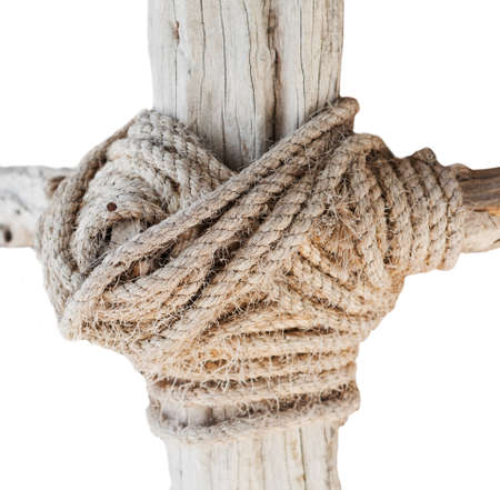 wooden structure with a thick rope closeup isolated on whote backgroundの写真素材