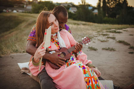 closeup portrait of a woman and manの写真素材