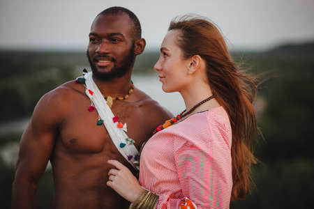 closeup portrait of a woman and manの写真素材