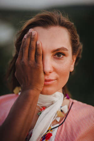 beautiful woman closes her eyes by her boyfriendの写真素材