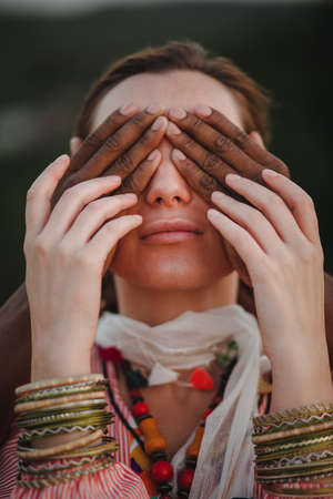 beautiful woman closes her eyes by her boyfriendの写真素材