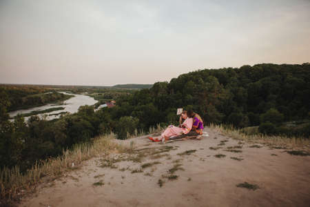 closeup portrait of a european woman and african american manの写真素材