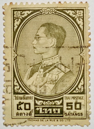 THAILAND : King Bhumibol post stamp printed in Thomas De La Rue & Co., Ltd., Englandのeditorial素材