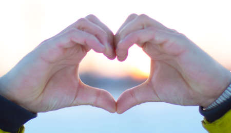 the figure shows the heart and handsの写真素材