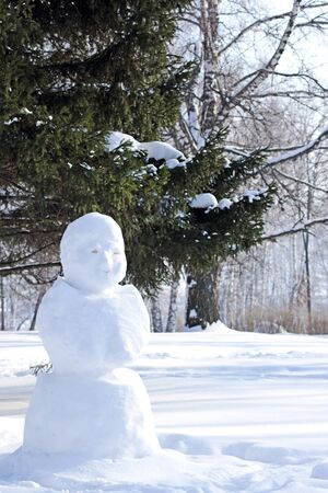 The snowman. The monument is made of white snow.の写真素材