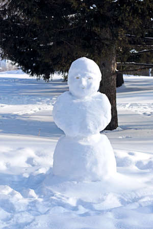 The snowman. The monument is made of white snow.の写真素材