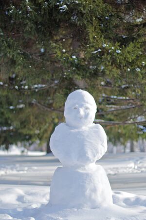 The snowman. The monument is made of white snow.の写真素材