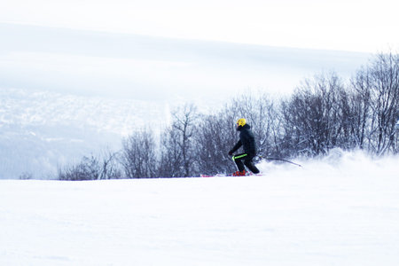 a man in a black jacket goes skiing 20のeditorial素材