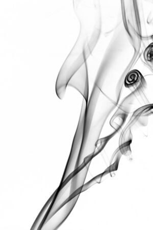 the image of smoke on a white background. Isolated black smokeの写真素材