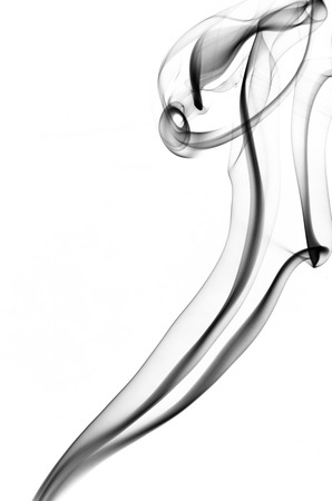 the image of smoke on a white background. Isolated black smokeの写真素材