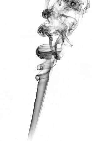 the image of smoke on a white background. Isolated black smokeの写真素材