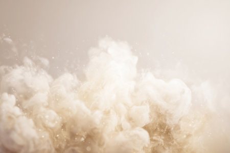 Swirling clouds of cream-colored mist rising gracefullyの素材