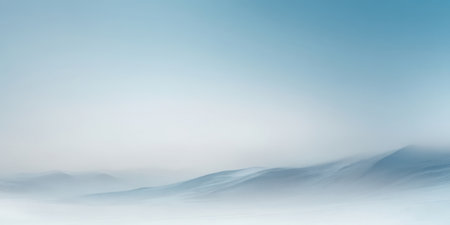 Soft blue hills stretch across the landscape as morning light filters through the clouds. The tranquil scene evokes calmness and peace in the early hours of the day.の素材