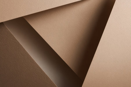 Layers of brown textured paper create a visually interesting arrangement. The interplay of angles and shadows adds depth to the composition, enhancing the overall design.の素材
