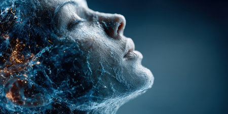 Womans face illuminated by glowing energy in a dark settingの素材