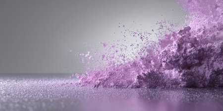 Purple powder spills dramatically on a smooth surface, forming interesting shapes and textures. The scene captures the beauty of color in motion and the contrast against a neutral backdrop.の素材