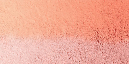 A soft gradient blends orange and pink hues, creating a smooth surface. The gentle transition in colors evokes warmth and calmness, suitable for artistic backgrounds or designs.の素材