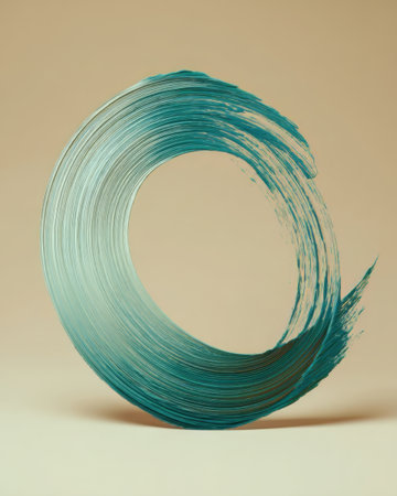 A circular brush stroke in a cool teal hue sits against a smooth beige background. The design showcases fluid movement and artistic creativity, creating a soothing visual effect.の素材