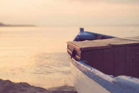 Close Up Of Wooden Blue Boat On The Beach. Vintage Filter Lookingの写真素材