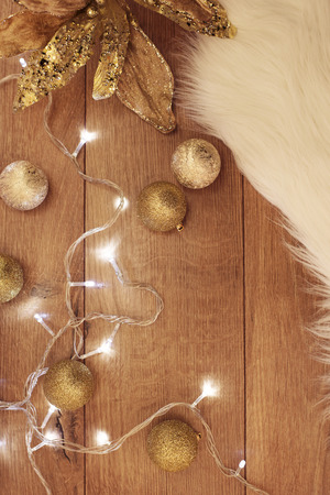 Gold Christmas balls and lights. Winter holidays conceptの写真素材