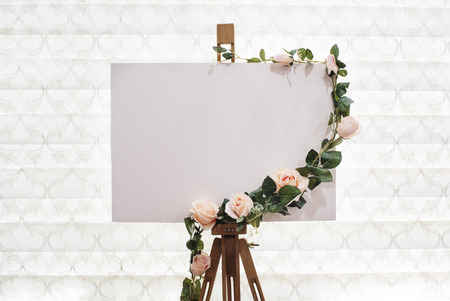 Wedding Sign. Wedding Board Mockup with flowers on top of itの写真素材