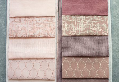 Fabric samples on the table. The designer workplace concept. Freelance fashion comfortable...
