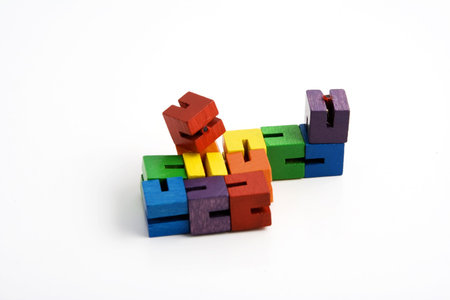 wooden blocks on string to help children focus their attention while studying in class teachers give to students that have learning disorders like adhdの写真素材