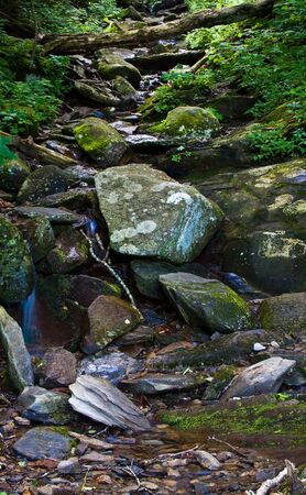 nice scenic view of a waterfall with silky smooth waterの写真素材