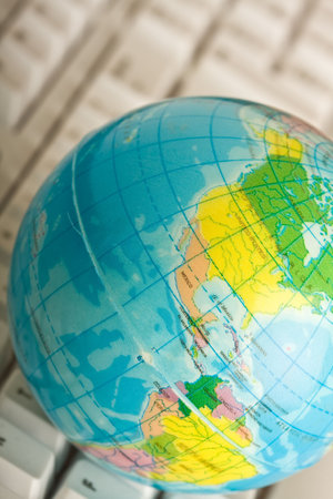 concept of the world wide web globe on a computer keyboard