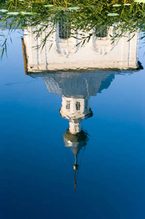 Church reflexion in waterの写真素材