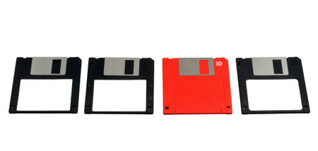 three black floppy disks and one red