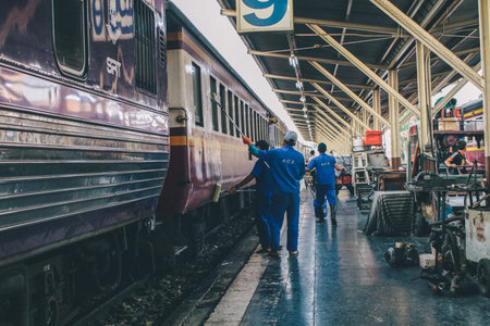 Bangkok, Thailand - SEP 14, 2019 : Staff clean the train by water every morning at Hua Lamphong