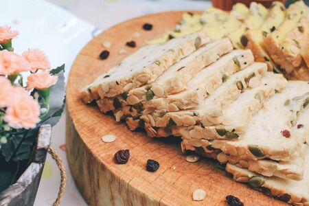 Homemade High fiber natural health food Sliced rye bread on cutting board. Whole grain rye bread with seedsの写真素材
