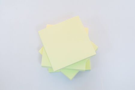 Yellow colored paper stickers isolated on a white background notepads and memo messages torn paper sheets. Vector blank sticky notepaper posts of meeting reminder, to do list and office notice or information board with appointment notesの写真素材