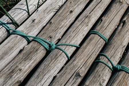 Nature bamboo board for design backdrop wallpaper tiled floor. Japanese style.old bamboo texture wall background .bamboo fence background.nature pattern bamboo fence. wallpaper wood nature bamboo grunge .closeup detail bamboo fence.の写真素材