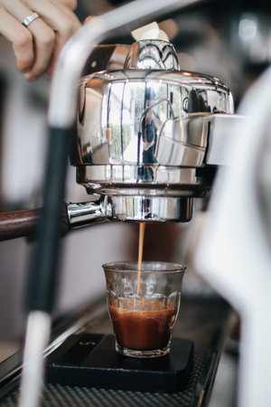 Coffee machine with steam in the process a cafe.Barista Cafe Making Coffee Preparation Service...