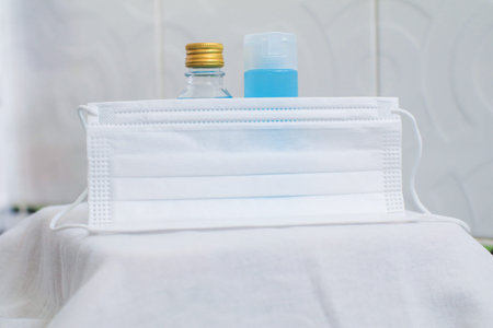 Health care and surgical concept. Coronavirus prevention medical surgical masks and hand sanitizes...