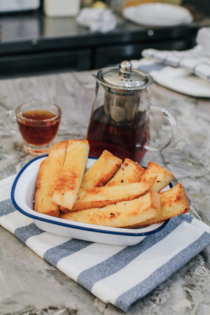 à¹‡Homemade garlic bread sticks grilled white butter , sugar and garlic look like toast.Crunchy...