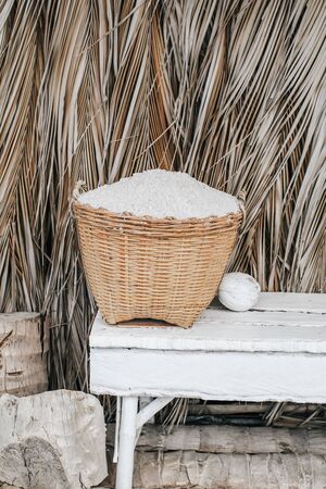 Salt farming in Thailand Sea salt is salt that is caused by the evaporation of sea water.Working keep sea salt in a basket. Used as a condiment for food, cooking, For preserving food.の写真素材