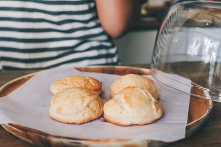 Close-up Homemade delicious English scone set with strawberry jam on the table. Horizontal,copy space for text, selective focus.の写真素材