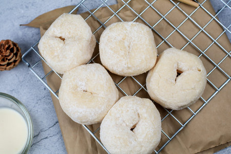 Fresh homemade sweet donuts with powdered sugar and dipping sauce with copy-space. Breakfast...