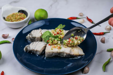 Seafood spicy dip eat with delicious Boiled fish . Thai traditional local food.の写真素材