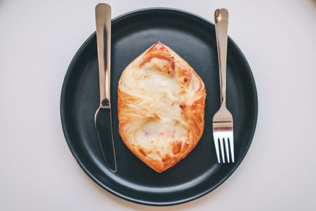 Fresh croissant sandwich with ham, cheese. Morning breakfast concept