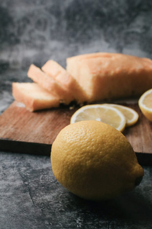 Lemon pound cake with slices of lemon sugar icing. Delicious breakfast, traditional tea time treat....